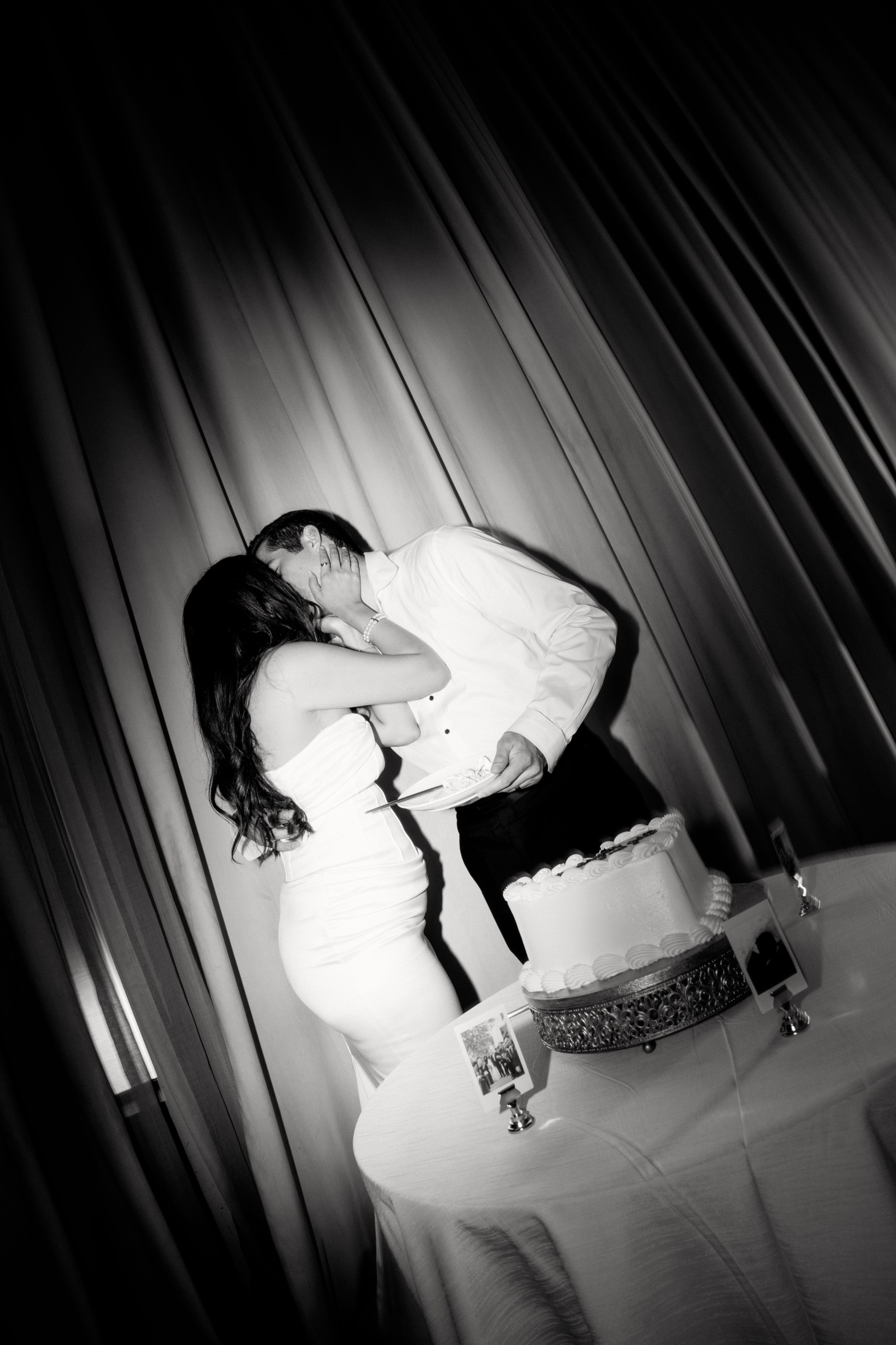 Black and white cake kiss editorial