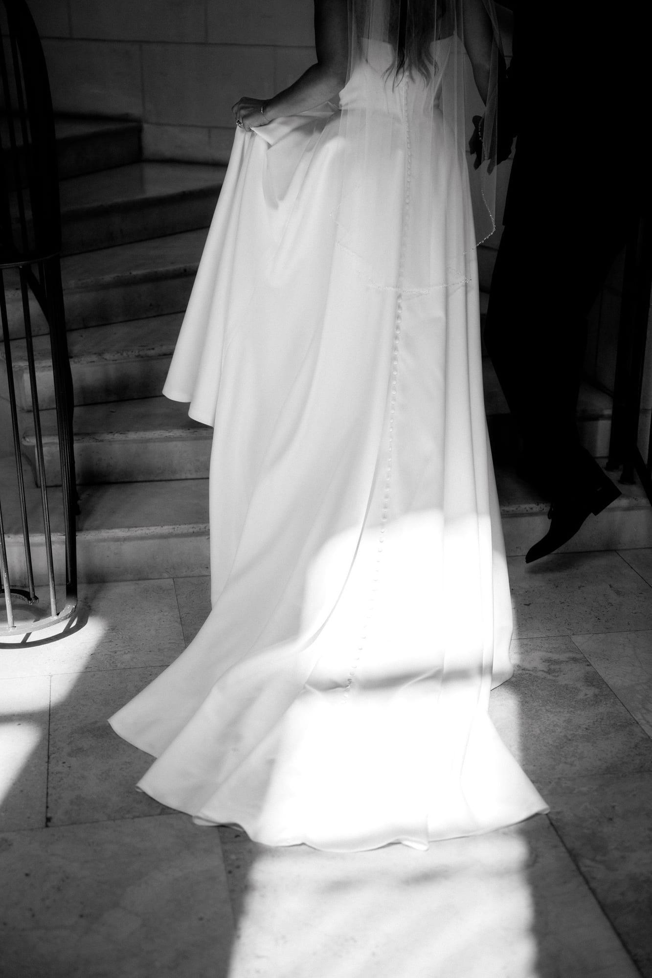 Bride on the spiral staircase inside the Lakewood Ranch clubhouse