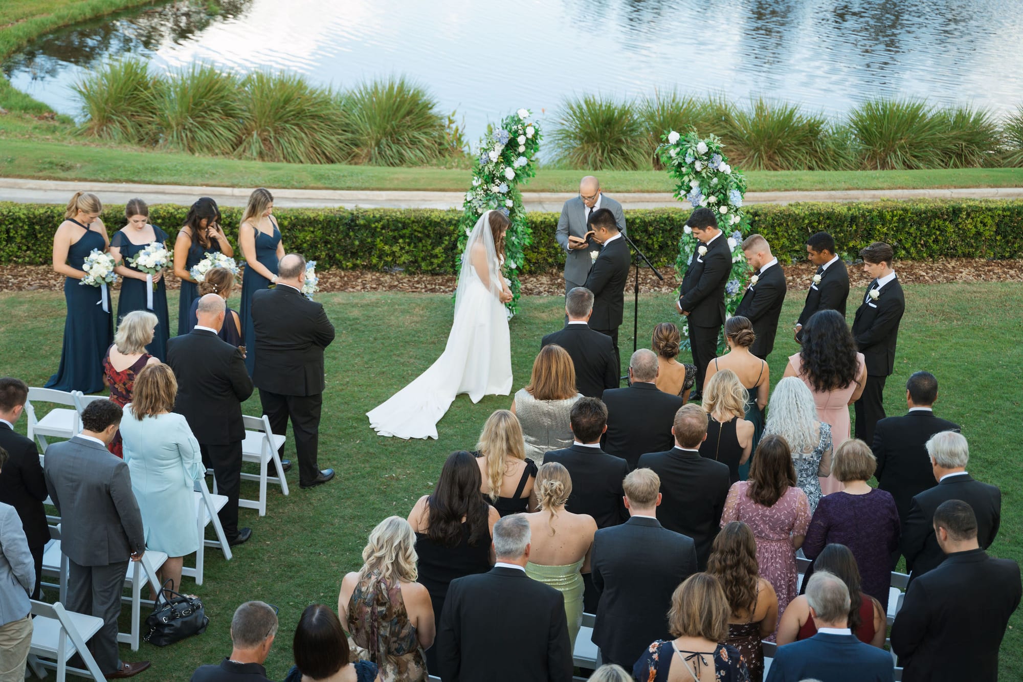 Outdoor wedding ceremony on the golf course lawn at Lakewood Ranch Golf and Country Club