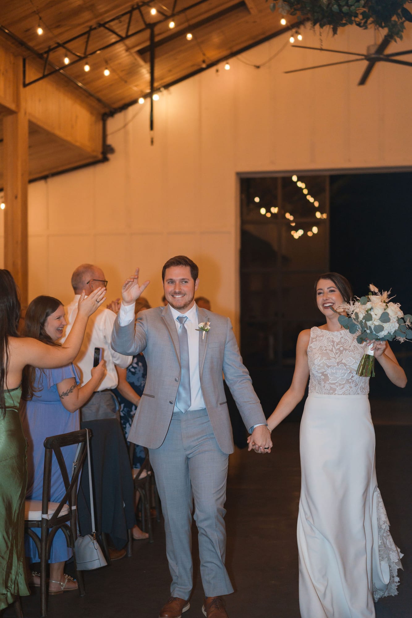 Bride and groom making their grand entrance into The Pavilion